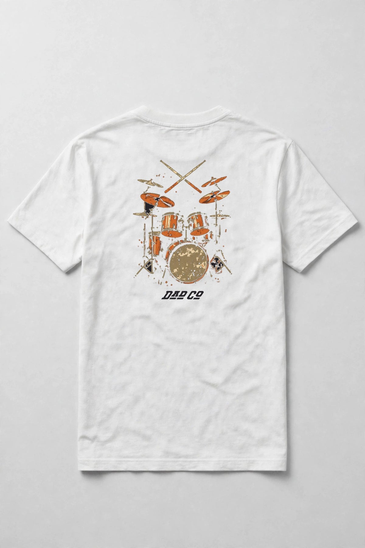 White drummer t-shirt back print: vintage burnt orange drum kit with crossed sticks, cream and orange distressed screen print, with DAD CO logo under the back print