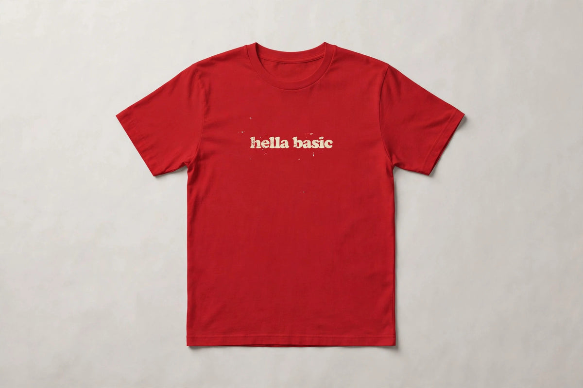 Hella Basic funny slang t-shirt in Red - distressed cream lowercase text, Bella Canvas tee, flat lay front view, funny sarcastic humor shirt