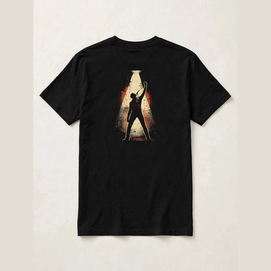 Black singer t-shirt back print: vocalist silhouette holding a vintage microphone inside a cream spotlight, burnt orange distressed frame