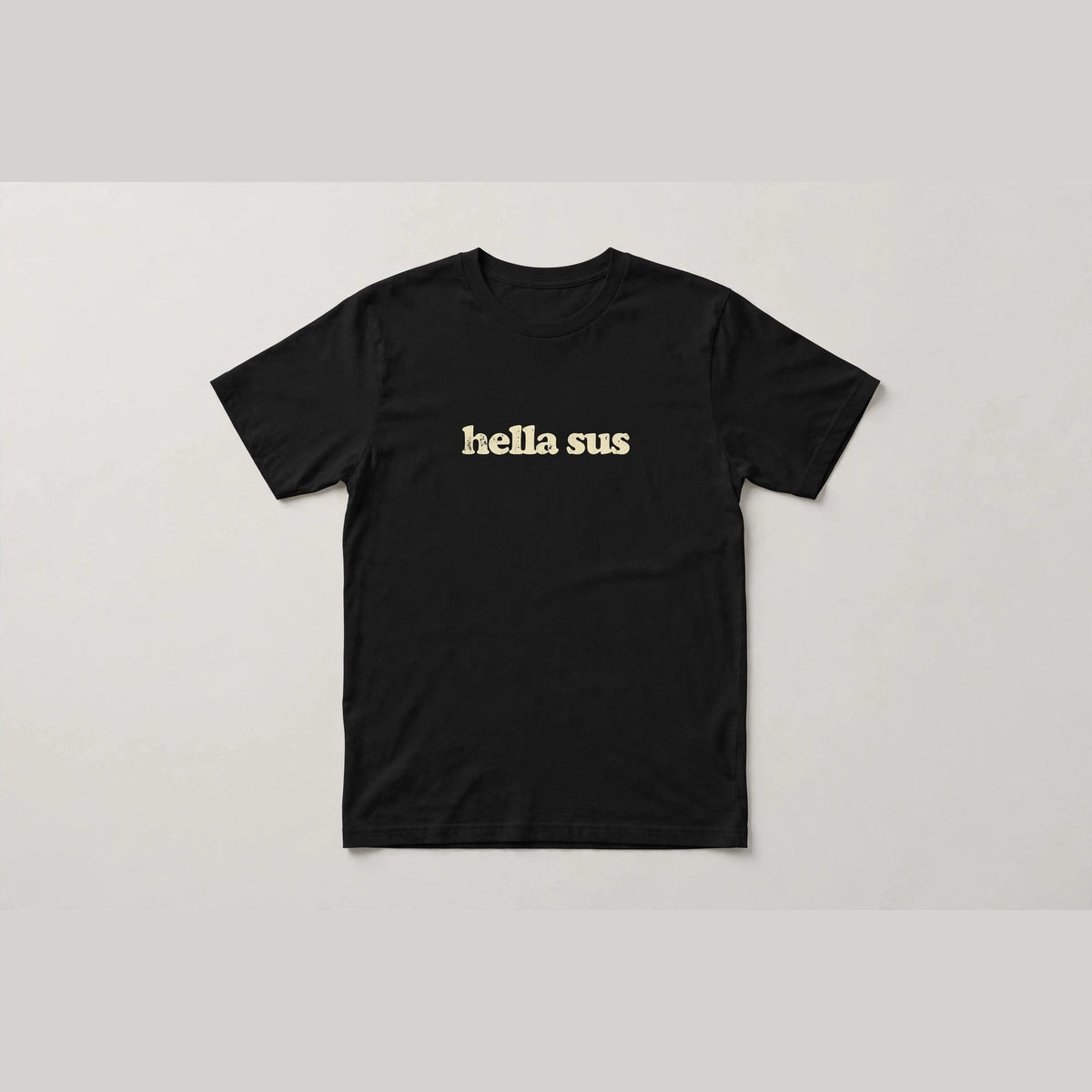 Hella Sus funny slang t-shirt in Black - distressed cream lowercase text, Bella Canvas tee, flat lay front view, funny suspicious humor shirt