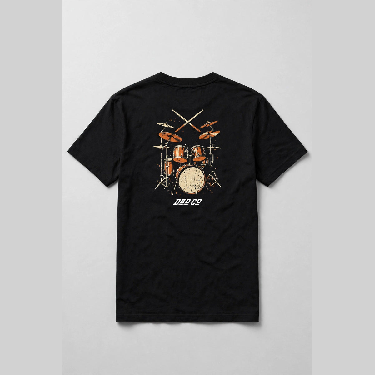 Black drummer t-shirt back print: vintage burnt orange drum kit with crossed sticks, cream and orange distressed screen print, with DAD CO logo under the back print