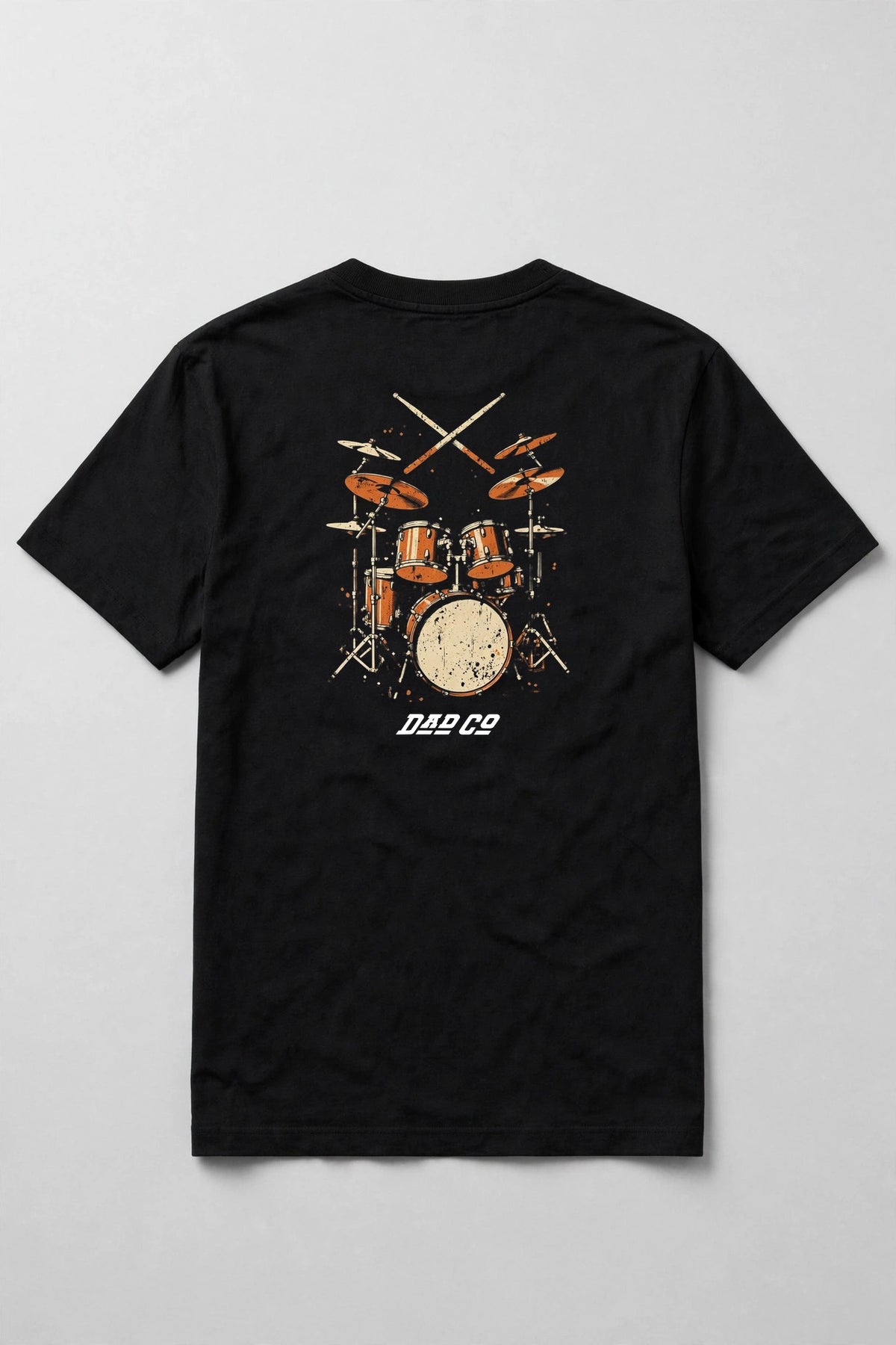 Black drummer t-shirt back print: vintage burnt orange drum kit with crossed sticks, cream and orange distressed screen print, with DAD CO logo under the back print