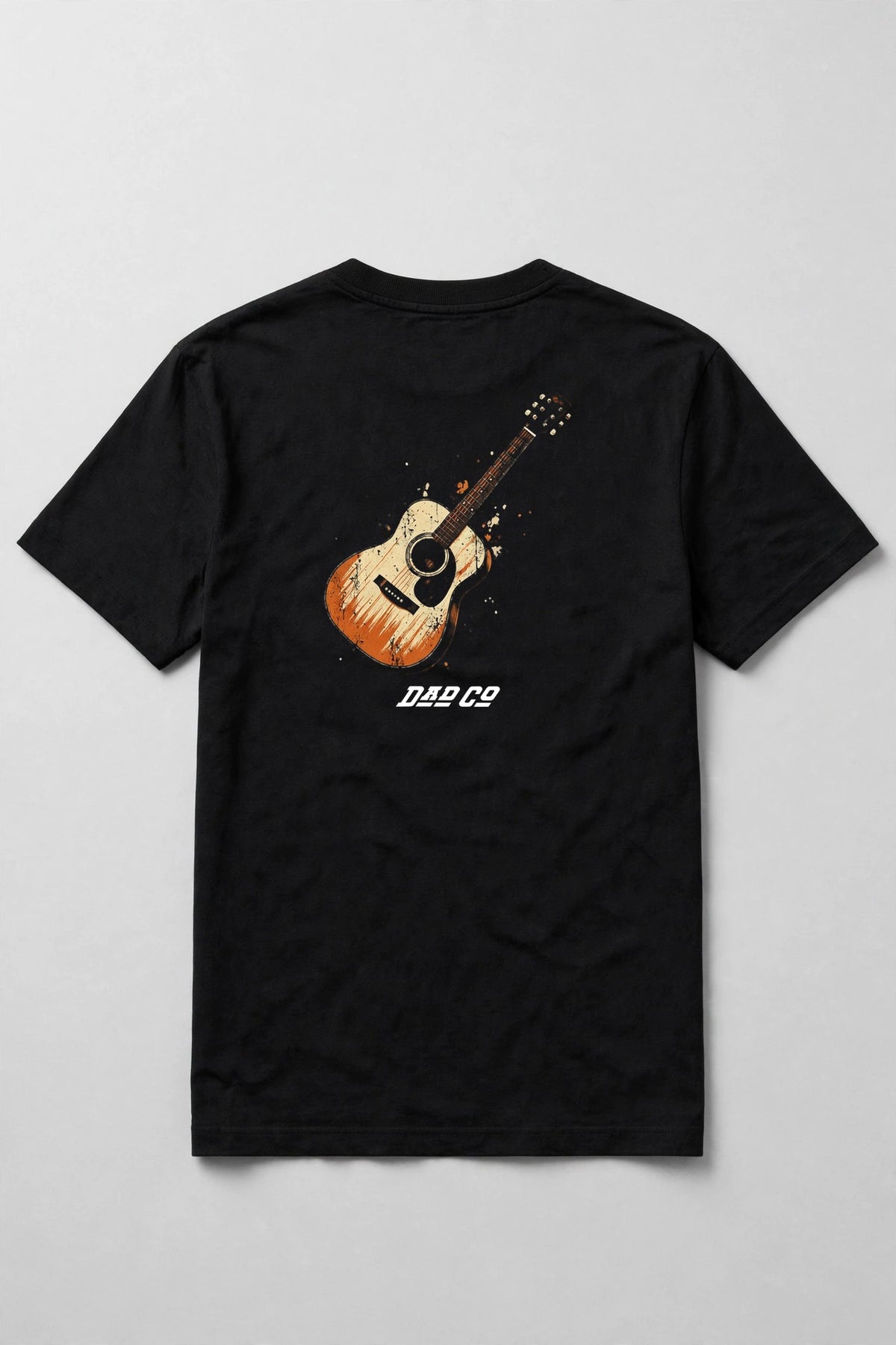 Black guitar t-shirt back print: natural wood acoustic dreadnought guitar, cream and burnt orange vintage distressed screen print, with DAD CO logo under the back print