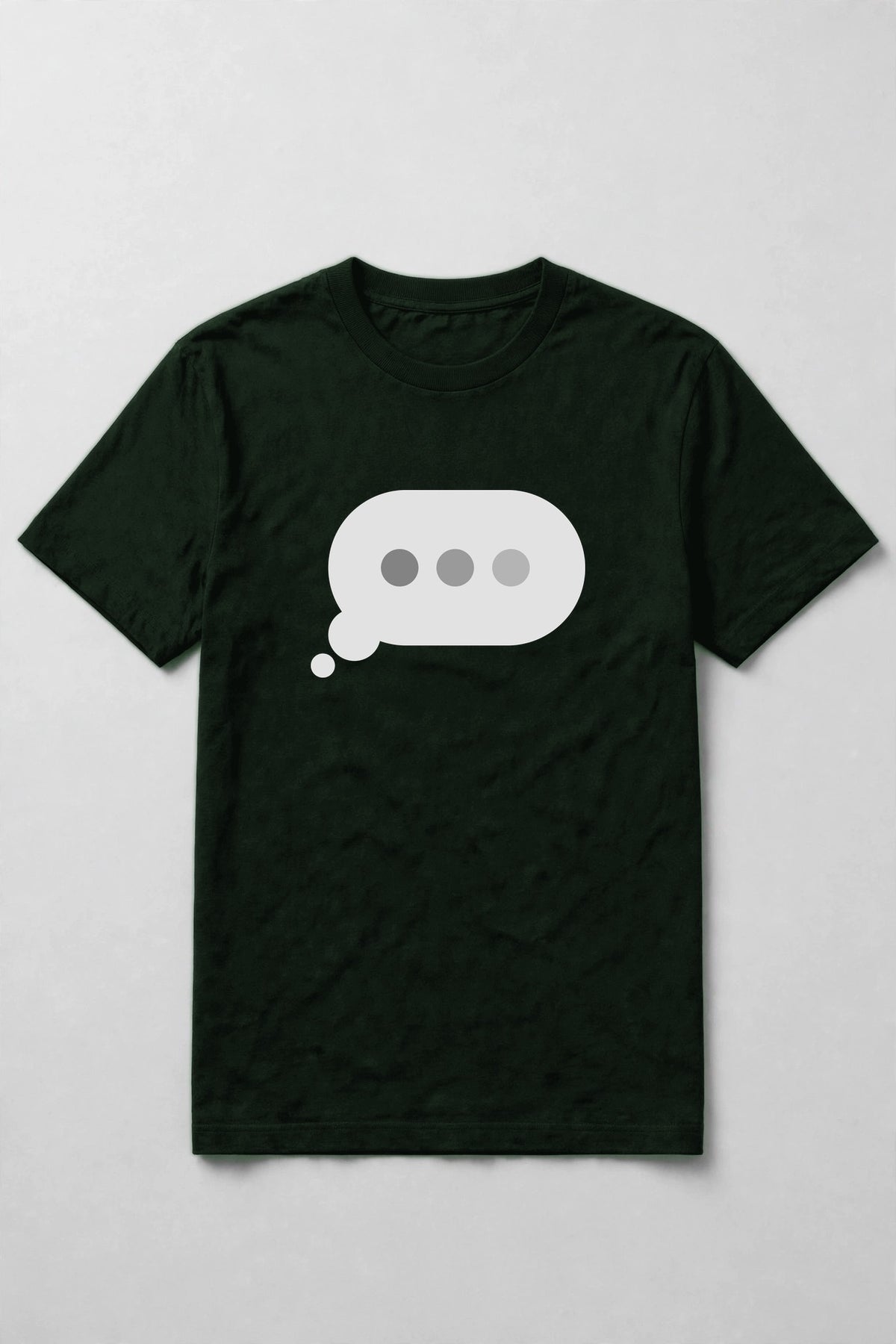 Typing dots shirt front print - big typing bubble with three dots front and center on forest Bella Canvas tee, shirt only flat lay