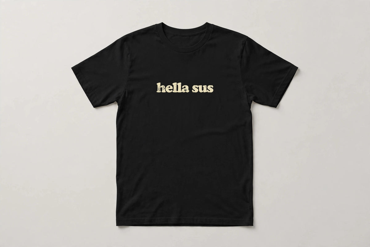 Hella Sus funny slang t-shirt in Black - distressed cream lowercase text, Bella Canvas tee, flat lay front view, funny suspicious humor shirt