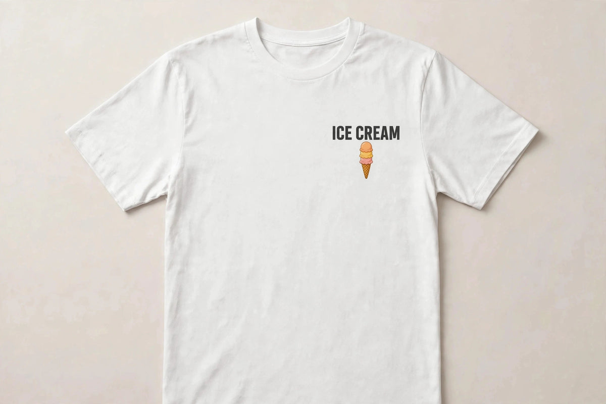 Ice cream shirt front - ICE CREAM dark ink chest print with small triple scoop cone icon below on white Bella Canvas tee flat lay