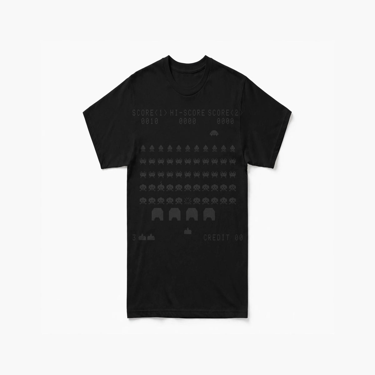 Space Invaders shirt front print - 1978 arcade playfield with invader formation, mothership, shields, laser cannon and SCORE 0010 HUD on black Bella Canvas tee