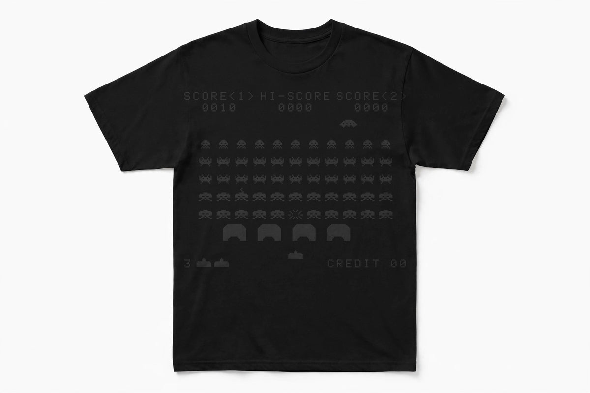 Space Invaders shirt flat lay - retro 1978 arcade game screen front print on black unisex tee