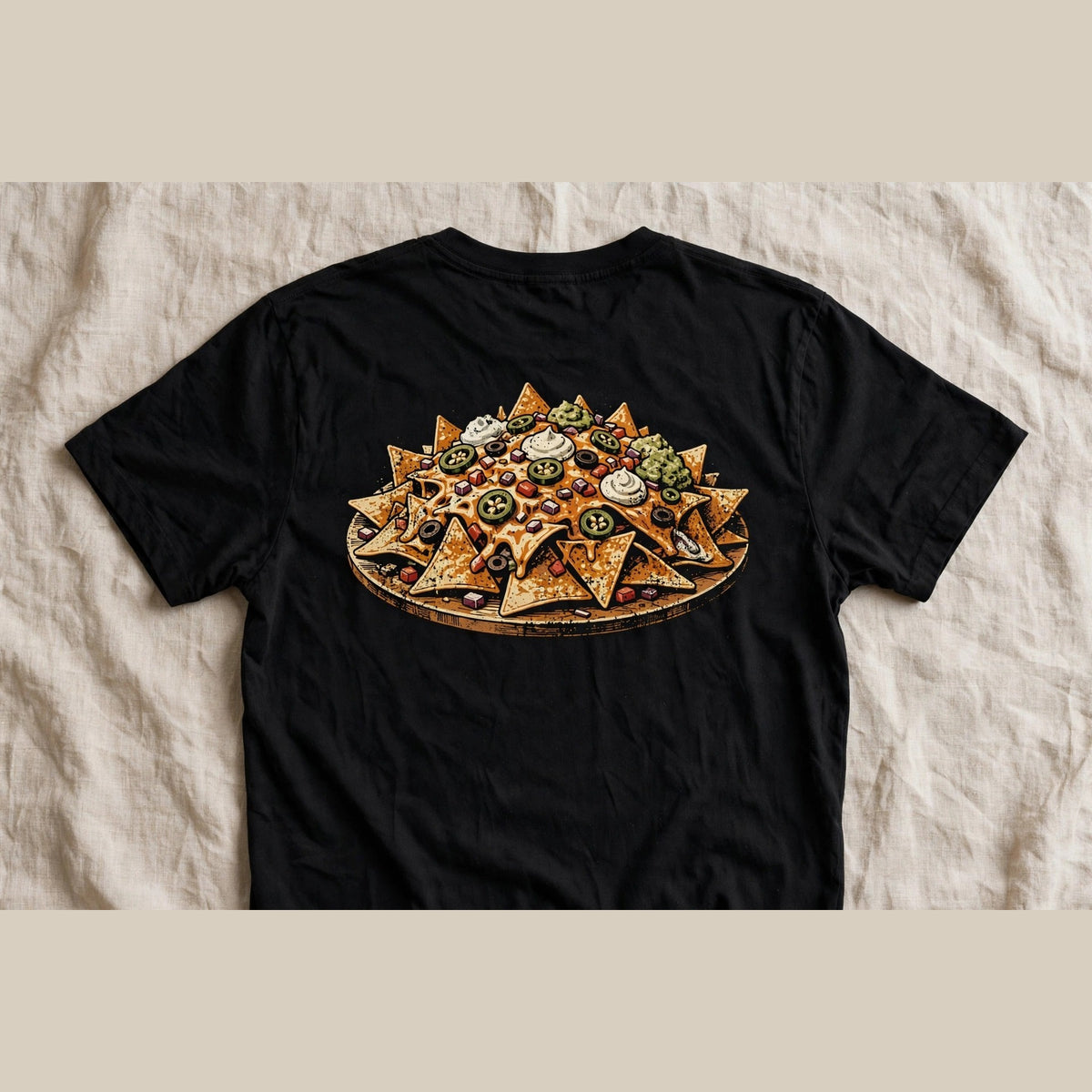 Nachos shirt back print - loaded nachos platter graphic on black Bella Canvas tee flat lay