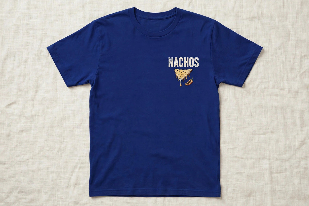 Nachos shirt front chest print - NACHOS word with nacho chip icon, white ink on blue Bella Canvas tee flat lay