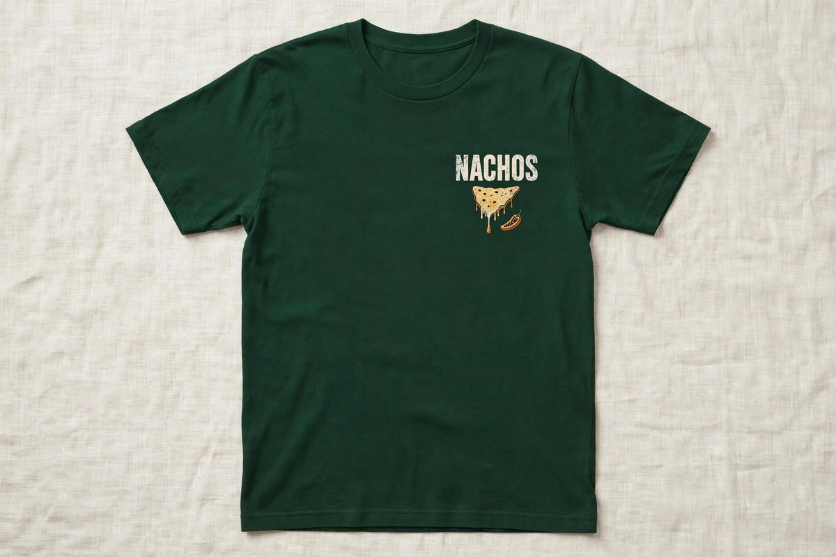 Nachos shirt front chest print - NACHOS word with nacho chip icon, white ink on green Bella Canvas tee flat lay