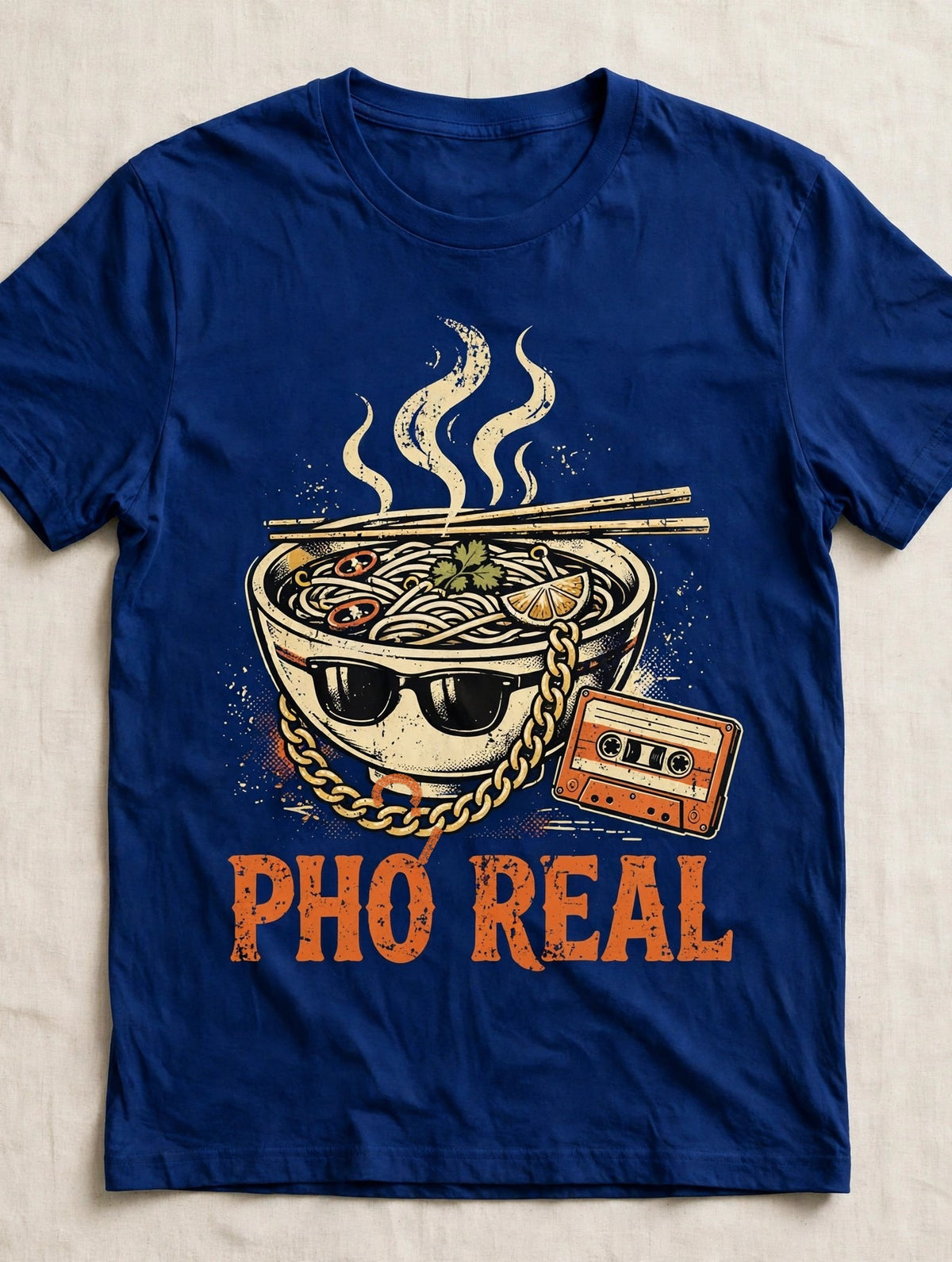 Phở Real pho shirt front print - vintage pho bowl graphic, ink on blue Bella Canvas tee flat lay